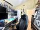 Comfortable home office setup with a professional chair and abundant equipment at 3404 Maritime Dr, Indianapolis, IN 46214