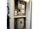 Utility closet containing a TRANE HVAC system and water heater at 3404 Maritime Dr, Indianapolis, IN 46214