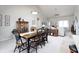 Inviting dining room with a wooden table, carpet and a decorative cabinet at 3645 Richland Dr, Columbus, IN 47203
