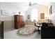Well-lit home office featuring a vaulted ceiling and neutral color scheme at 3645 Richland Dr, Columbus, IN 47203