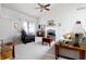 Cozy living room featuring a fireplace, comfortable seating, and plenty of natural light at 3645 Richland Dr, Columbus, IN 47203