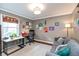 Cozy bedroom with desk, lots of natural light, and neutral colors at 3713 Coventry Way, Carmel, IN 46033