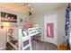 bedroom with white bunkbed, ceiling fan, decor and gray carpet flooring at 3713 Coventry Way, Carmel, IN 46033