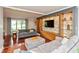 Spacious living room filled with natural light, featuring hardwood floors and stylish contemporary decor at 3713 Coventry Way, Carmel, IN 46033