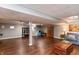 Spacious living room featuring sleek wood floors and a comfortable seating arrangement at 3713 Coventry Way, Carmel, IN 46033