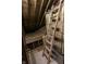 This is an image of the unfinished attic space, accessible via ladder for easy storage at 3819 S Village Dr, New Palestine, IN 46163