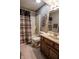 This is an image of the bathroom with a shower and tub and neutral color scheme at 3819 S Village Dr, New Palestine, IN 46163