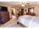 This is an image of the main bedroom with ensuite access and comfortable furnishings at 3819 S Village Dr, New Palestine, IN 46163
