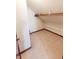 Attic closet with carpet and clothes rod at 3819 S Village Dr, New Palestine, IN 46163