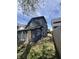 Backyard featuring weathered siding and a narrow path at 409 Parkway Ave, Indianapolis, IN 46225