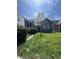 Charming single-Gathering home with a walkway and a cozy, welcoming front yard at 409 Parkway Ave, Indianapolis, IN 46225