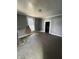 Spacious living room with light gray walls and wood-look flooring at 409 Parkway Ave, Indianapolis, IN 46225