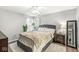 Inviting bedroom with a plush bed, soft rug, and lots of natural light from the windows at 4167 Apple Creek Dr, Indianapolis, IN 46235