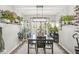 Inviting dining room with stylish light fixtures, modern decor, and plenty of natural light at 4167 Apple Creek Dr, Indianapolis, IN 46235