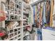 Organized walk-in closet with shelves, rods, and compartments for easy storage and display at 4167 Apple Creek Dr, Indianapolis, IN 46235