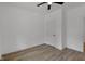 Comfortable bedroom with new flooring, ceiling fan, and ample lighting at 4230 Kingsley Dr, Indianapolis, IN 46205
