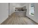 Open-concept kitchen featuring modern appliances, stylish backsplash, and ample counter space at 4230 Kingsley Dr, Indianapolis, IN 46205