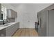 Stylish kitchen featuring stainless steel appliances, sleek countertops, and ample cabinet space at 4234 Kingsley Dr, Indianapolis, IN 46205