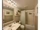 Bathroom with tub, vanity, and decorative shelving offering a clean and functional space at 4625 Woodcrest Dr, Columbus, IN 47203