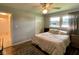 Bedroom with a closet, neutral tones, and a bright window at 4625 Woodcrest Dr, Columbus, IN 47203