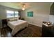 Bedroom featuring stylish rug, neutral tones, and natural light at 4625 Woodcrest Dr, Columbus, IN 47203