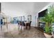 Open concept living space with dining room, kitchen, and fireplace at 4640 Autumn Ridge Dr, Columbus, IN 47203