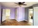 Bedroom featuring hardwood floors, ceiling fan, and neutral wall paint at 4853 Wentworth Blvd, Indianapolis, IN 46201