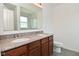 Bathroom features double vanity with granite countertop at 5151 Climbing Rose Pl, Indianapolis, IN 46254