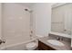 Bathroom featuring a shower-tub combo, granite-topped vanity and sink at 5151 Climbing Rose Pl, Indianapolis, IN 46254