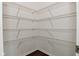 Walk-in pantry with wire shelving to maximize storage space at 5151 Climbing Rose Pl, Indianapolis, IN 46254