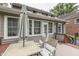 Relaxing outdoor deck featuring comfortable seating, offering a perfect spot for leisure and entertaining at 5306 N Kenwood Ave, Indianapolis, IN 46208