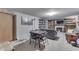Finished basement offering a entertainment area with seating and a laundry room at 5306 N Kenwood Ave, Indianapolis, IN 46208
