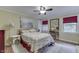 Comfortable bedroom with hardwood floors, natural lighting, and classic decor and furniture at 5306 N Kenwood Ave, Indianapolis, IN 46208