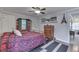 Bright bedroom with a cozy design, hardwood floors, and an archway with built-in shelves at 5306 N Kenwood Ave, Indianapolis, IN 46208