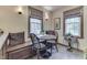 Cozy breakfast nook features built-in bench seating and two windows with natural light at 5306 N Kenwood Ave, Indianapolis, IN 46208