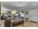 Spacious living room with a fireplace, hardwood floors, and stylish decor at 5306 N Kenwood Ave, Indianapolis, IN 46208