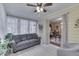 Comfortable sunroom features a sliding glass door and plenty of natural light at 5306 N Kenwood Ave, Indianapolis, IN 46208