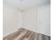 This bedroom offers modern flooring and fresh paint, creating a bright and inviting space at 564 S Bosart Ave, Indianapolis, IN 46203