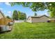 View of the yard, above ground pool, and back of the house at 580 Northgate Dr, Greenwood, IN 46143