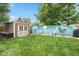 Private backyard featuring a storage shed and a quaint seating area at 580 Northgate Dr, Greenwood, IN 46143