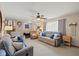 Cozy living room with plush seating, a ceiling fan, and plenty of natural light at 580 Northgate Dr, Greenwood, IN 46143