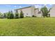 Green backyard provides ample space for activities and relaxation with a charming residential building at 5852 Long Ridge Pl, Indianapolis, IN 46221