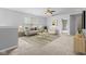 A comfortable living room featuring stylish furnishings, a bright window, and modern decor at 5852 Long Ridge Pl, Indianapolis, IN 46221