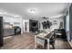 Expansive living room with combined kitchen, dining and lounge spaces, featuring updated floors at 5858 N West Shore Dr, Morgantown, IN 46160