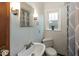 This is a bathroom with a sink, toilet and window at 6005 Winthrop Ave, Indianapolis, IN 46220