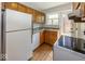 Functional kitchen design with ample cabinet space and modern appliances at 6005 Winthrop Ave, Indianapolis, IN 46220