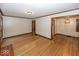 Spacious living room with hardwood floors, classic trim, and ample natural light at 6005 Winthrop Ave, Indianapolis, IN 46220