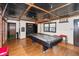 Finished basement with a pool table, bar area, and unique design details at 615 E Stop 11 Rd, Indianapolis, IN 46227