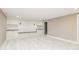 The carpeted basement has a built-in bench with shelving, storage, and recessed lighting at 625 E 57Th St, Indianapolis, IN 46220