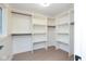 Spacious walk-in closet with custom shelving and racks, providing ample storage space and organization at 625 E 57Th St, Indianapolis, IN 46220